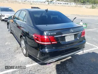 2014 Mercedes-Benz E 350 Sport with VIN WDDHF5KBXEA889555, listed as a IAAI auction lot 41589052 with 148,422 mi miles and . Bid and sale history available at DreamBid. Image 3.