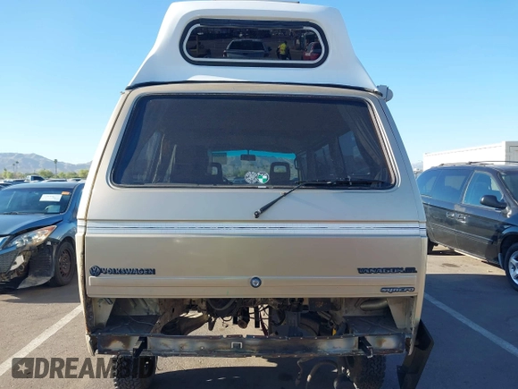 1987 Volkswagen Vanagon with VIN WV2YB0252HG069458, listed as a IAAI auction lot 41945327 with Not Provided miles and . Bid and sale history available at DreamBid. Image 17.