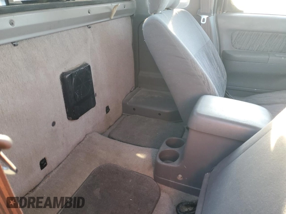1999 Nissan Frontier XE with VIN 1N6ED26Y4XC322021, listed as a Copart auction lot 82690214 with 102,758 mi miles and Clean title. Bid and sale history available at DreamBid. Image 10.