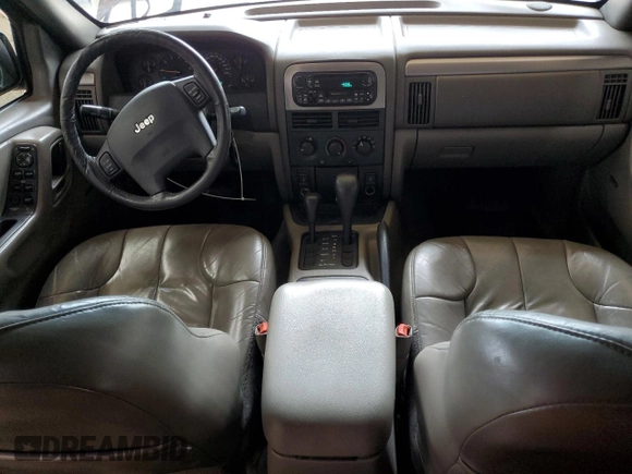 2001 Jeep Grand Cherokee Laredo z VIN 1J4GW48S11C609344, wystawiony jako Copart lot #59258245 z przebiegiem 162 141 mil mil oraz Szkoda całkowita • Salvage title. Historia ofert i sprzedaży dostępna na DreamBid. Obrazek 8.
