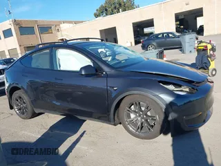 2024 Tesla Model Y Long Range with VIN 7SAYGAEE7RF126351, listed as a IAAI auction lot 41282973 with 5,919 mi miles. Bid and sale history available at carsss.com. Image 12.