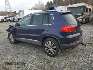 2013 Volkswagen Tiguan S with VIN WVGBV3AX0DW066778, listed as a Copart auction lot 85110984 with 108,027 mi miles and Salvage title. Bid and sale history available at DreamBid. Image 2.