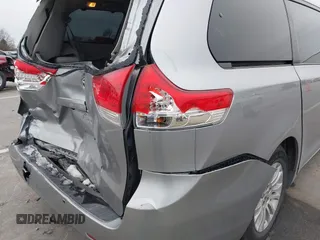 2011 Toyota Sienna XLE AAS with VIN 5TDYK3DC5BS150527, listed as a IAAI auction lot 41143189 with 147,551 mi miles and . Bid and sale history available at DreamBid. Image 20.