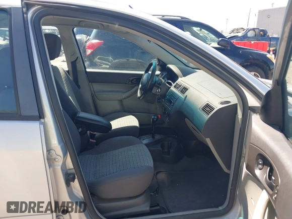 2007 Ford Focus S with VIN 1FAFP34N97W131230, listed as a IAAI auction lot 42661651 with 221,807 mi miles and . Bid and sale history available at DreamBid. Image 5.