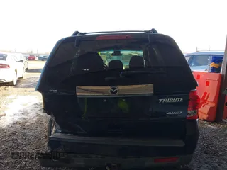 2011 Mazda Tribute Sport with VIN 4F2CY9C7XBKM06202, listed as a IAAI auction lot 41281197 with 195,443 mi miles and . Bid and sale history available at DreamBid. Image 15.