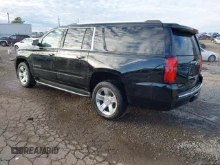 2020 Chevrolet Suburban Premier with VIN 1GNSCJKC0LR121728, listed as a IAAI auction lot 41105003 with 43,820 mi miles and . Bid and sale history available at DreamBid. Image 3.