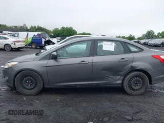 2012 Ford Focus SE z VIN 1FAHP3F29CL442731, wystawiony jako IAAI lot #42517796 z przebiegiem 148 728 mil mil oraz . Historia ofert i sprzedaży dostępna na DreamBid. Obrazek 14.