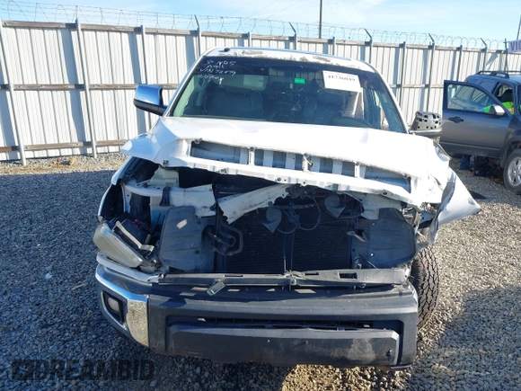 2014 Toyota Tundra 4WD Truck LTD with VIN 5TFHW5F16EX372679, listed as a IAAI auction lot 41736049 with 247,000 mi miles. Bid and sale history available at carsss.com. Image 12.