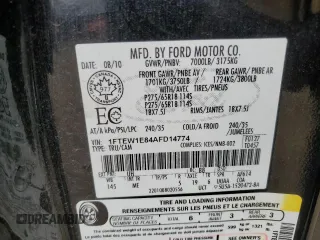 2010 Ford F-150 XL with VIN 1FTEW1E84AFD14774, listed as a Copart auction lot 60530435 with 150,299 mi miles and Salvage title. Bid and sale history available at DreamBid. Image 12.