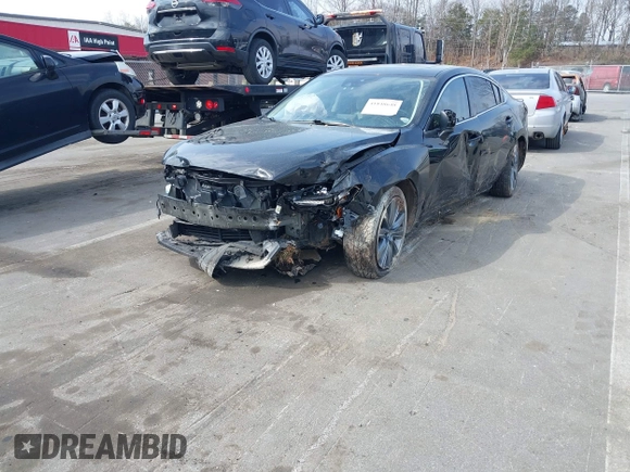 2018 Mazda 6 Touring with VIN JM1GL1VM2J1313375, listed as a IAAI auction lot 41848648 with 93,717 mi miles and . Bid and sale history available at DreamBid. Image 2.