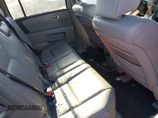 2009 Honda Pilot Touring with VIN 5FNYF48979B008851, listed as a IAAI auction lot 41252736 with 183,292 mi miles and . Bid and sale history available at carsss.com. Image 8.