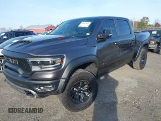 2022 Ram 1500 TRX with VIN 1C6SRFU99NN144769, listed as a IAAI auction lot 40937963 with 20,125 mi miles. Bid and sale history available at carsss.com. Image 2.