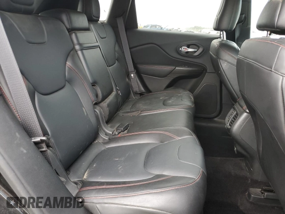 2014 Jeep Cherokee Trailhawk z VIN 1C4PJMBS2EW237725, wystawiony jako Copart lot #62666745 z przebiegiem 130 709 mil mil oraz Szkoda całkowita • Salvage title. Historia ofert i sprzedaży dostępna na DreamBid. Obrazek 11.