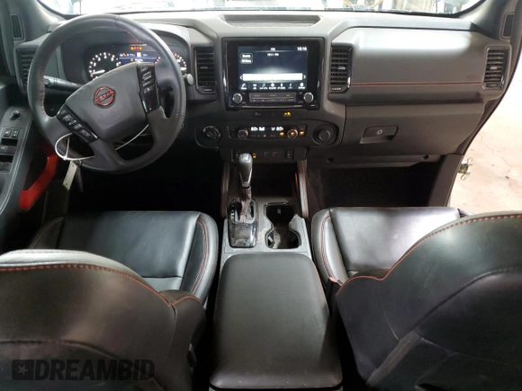 2023 Nissan Frontier Pro-4X z VIN 1N6ED1EK4PN671708, wystawiony jako Copart lot #58271305 z przebiegiem 22 906 mil mil oraz Szkoda całkowita • Salvage title. Historia ofert i sprzedaży dostępna na DreamBid. Obrazek 8.