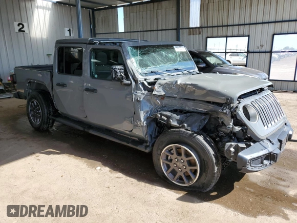 2023 Jeep Gladiator Overland with VIN 1C6HJTFG2PL542657, listed as a Copart auction lot 63384465 with 29,728 mi miles and Non repairable. Bid and sale history available at DreamBid. Image 4.