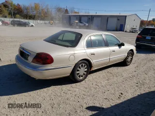 2002 Lincoln Continental with VIN 1LNHM97V62Y699096, listed as a Copart auction lot 77789474 with 106,198 mi miles and Clean Title. Bid and sale history available at carsss.com. Image 3.