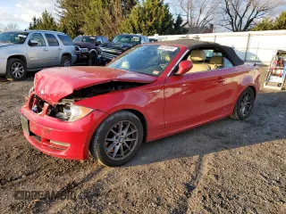 2010 BMW 1 Series 128i with VIN WBAUL7C54AVJ77712, listed as a Copart auction lot 83158294 with Not Provided miles and Salvage Title. Bid and sale history available at carsss.com. Image 1.