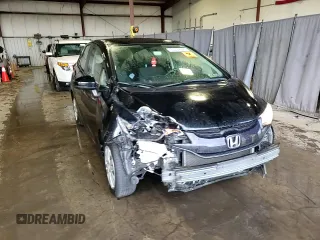 2016 Honda Fit LX z VIN JHMGK5H58GX016226, wystawiony jako Copart lot #60234945 z przebiegiem 130 432 mil mil oraz Szkoda całkowita • Salvage title. Historia ofert i sprzedaży dostępna na DreamBid. Obrazek 13.