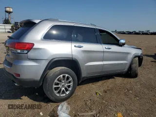 2014 Jeep Grand Cherokee Limited z VIN 1C4RJFBG7EC204799, wystawiony jako Copart lot #62458805 z przebiegiem 126 966 mil mil oraz Szkoda całkowita • Salvage title. Historia ofert i sprzedaży dostępna na DreamBid. Obrazek 3.