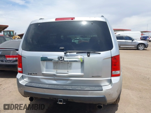 2011 Honda Pilot Touring z VIN 5FNYF3H90BB006634, wystawiony jako IAAI lot #42388390 z przebiegiem 218 475 mil mil oraz . Historia ofert i sprzedaży dostępna na DreamBid. Obrazek 16.