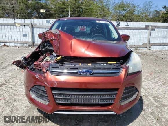2015 Ford Escape SE with VIN 1FMCU0GX7FUC41765, listed as a Copart auction lot 52142305 with 79,684 mi miles and Salvage Title. Bid and sale history available at DreamBid. Image 5.