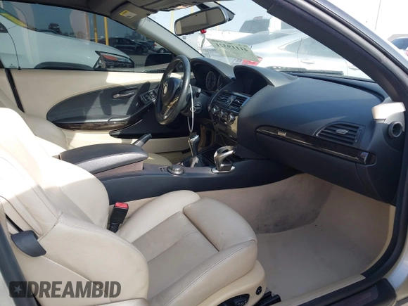 2006 BMW 6 Series 650Ci z VIN WBAEK13486CN72278, wystawiony jako IAAI lot #41119321 z przebiegiem 170 553 mil mil oraz . Historia ofert i sprzedaży dostępna na DreamBid. Obrazek 5.