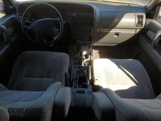1999 Isuzu Trooper S z VIN JACDJ58X3X7917365, wystawiony jako Copart lot #76065174 z przebiegiem 228 254 mil mil oraz Szkoda całkowita • Salvage title. Historia ofert i sprzedaży dostępna na DreamBid. Obrazek 8.