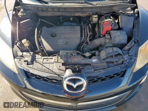 2012 Mazda CX-7 i Sport z VIN JM3ER2B54C0419755, wystawiony jako Copart lot #47737415 z przebiegiem 162 616 mil mil oraz Szkoda całkowita • Salvage title. Historia ofert i sprzedaży dostępna na DreamBid. Obrazek 12.