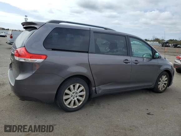 2012 Toyota Sienna XLE with VIN 5TDDK3DC2CS038316, listed as a Copart auction lot 52694245 with 273,415 mi miles and Clean Title. Bid and sale history available at DreamBid. Image 3.
