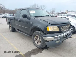 2000 Ford F-150 XL with VIN 1FTRX18L0YKA64773, listed as a IAAI auction lot 41902697 with 110,753 mi miles. Bid and sale history available at carsss.com. Image 1.