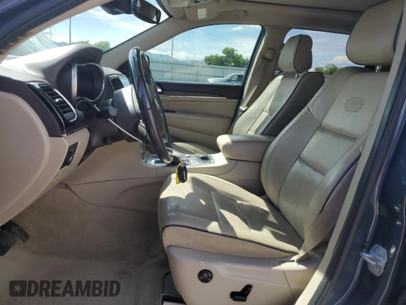 2020 Jeep Grand Cherokee High Altitude with VIN 1C4RJFCT0LC225003, listed as a Copart auction lot 56687565 with 125,090 mi miles and Salvage title. Bid and sale history available at DreamBid. Image 7.