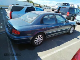 2002 Hyundai Sonata GLS with VIN KMHWF35H12A702457, listed as a Copart auction lot 60985574 with 99,698 mi miles and Salvage Title. Bid and sale history available at carsss.com. Image 3.