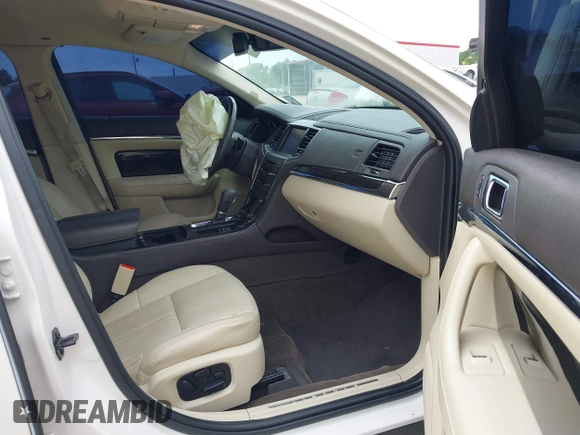 2013 Lincoln MKS with VIN 1LNHL9DKXDG604710, listed as a IAAI auction lot 42001875 with 117,724 mi miles and . Bid and sale history available at DreamBid. Image 5.