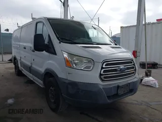 2016 Ford Transit Cargo with VIN 1FTYE9ZM9GKA01015, listed as a IAAI auction lot 42533387 with 186,555 mi miles and . Bid and sale history available at DreamBid. Image 1.