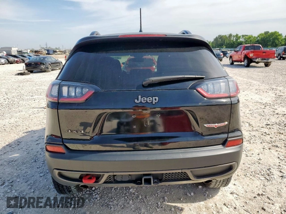 2022 Jeep Cherokee Trailhawk with VIN 1C4PJMBX5ND549240, listed as a Copart auction lot 56743785 with 11,392 mi miles and Salvage title. Bid and sale history available at DreamBid. Image 6.