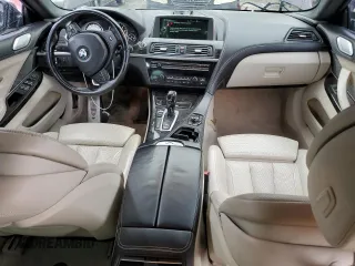 2014 BMW 6 Series 650i z VIN WBA6B2C5XED128959, wystawiony jako Copart lot #44201745 z przebiegiem 146 875 mil mil oraz Szkoda całkowita • Salvage title. Historia ofert i sprzedaży dostępna na DreamBid. Obrazek 8.