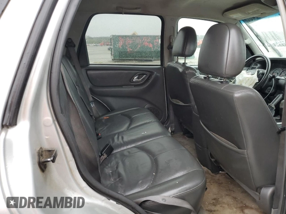 2006 Mazda Tribute i with VIN 4F2YZ02Z26KM14821, listed as a Copart auction lot 71718434 with 318,841 mi miles and Salvage Title. Bid and sale history available at carsss.com. Image 11.