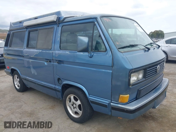 1989 Volkswagen Vanagon with VIN WV2YB0252KH059286, listed as a IAAI auction lot 42137080 with 130,604 mi miles and . Bid and sale history available at DreamBid. Image 1.