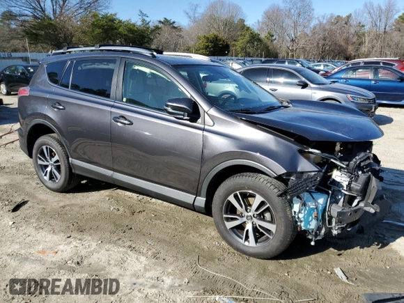 2018 Toyota RAV4 XLE with VIN JTMRFREV7JJ225848, listed as a Copart auction lot 47878355 with Not Provided miles and Salvage Title. Bid and sale history available at DreamBid. Image 4.