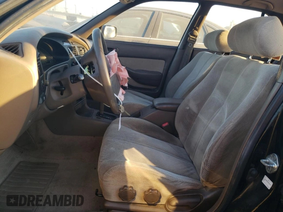 1995 Toyota Camry LE with VIN JT2GK12E2S0079545, listed as a Copart auction lot 84058164 with 150,539 mi miles and Salvage Title. Bid and sale history available at carsss.com. Image 7.