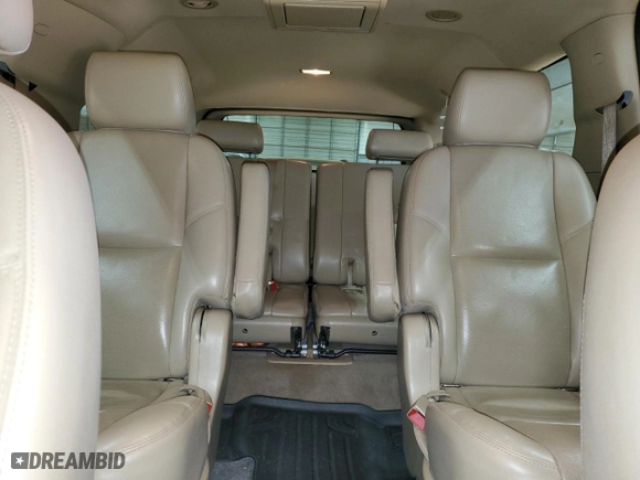 2014 Chevrolet Suburban LTZ with VIN 1GNSCKE0XER127997, listed as a Copart auction lot 42411525 with 228,690 mi miles and Salvage Title. Bid and sale history available at carsss.com. Image 10.