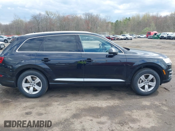 2019 Audi Q7 Premium with VIN WA1AHAF74KD034469, listed as a IAAI auction lot 42037259 with 92,404 mi miles and . Bid and sale history available at DreamBid. Image 13.