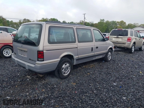 1992 Dodge Caravan Grand SE z VIN 1B4GH44R5NX258694, wystawiony jako IAAI lot #42197603 z przebiegiem 152 591 mil mil oraz . Historia ofert i sprzedaży dostępna na DreamBid. Obrazek 4.