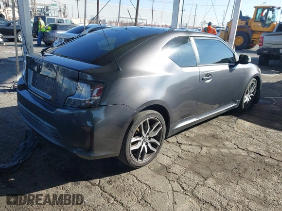 2016 Scion tC with VIN JTKJF5C78GJ014184, listed as a IAAI auction lot 41622575 with 128,520 mi miles. Bid and sale history available at carsss.com. Image 4.