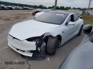 2020 Tesla Model S Long Range with VIN 5YJSA1E2XLF403088, listed as a Copart auction lot 64662604 with Not Provided miles and Salvage Title. Bid and sale history available at DreamBid. Image 1.