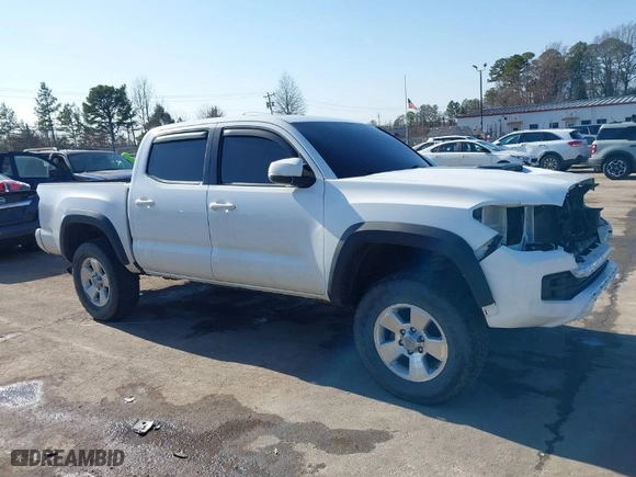 2019 Toyota Tacoma 4WD SR with VIN 5TFCZ5AN6KX194425, listed as a IAAI auction lot 41345357 with 79,574 mi miles. Bid and sale history available at carsss.com. Image 14.