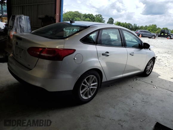 2017 Ford Focus SE with VIN 1FADP3F21HL258115, listed as a Copart auction lot 60151275 with 42,450 mi miles and Salvage title. Bid and sale history available at DreamBid. Image 3.