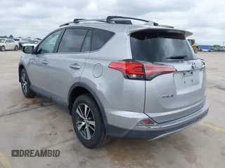 2017 Toyota RAV4 XLE with VIN 2T3WFREV3HW321796, listed as a IAAI auction lot 42080479 with 104,014 mi miles and . Bid and sale history available at DreamBid. Image 3.