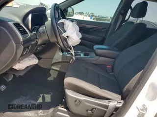 2021 Jeep Grand Cherokee Laredo E with VIN 1C4RJEAG7MC596709, listed as a Copart auction lot 57466875 with 56,164 mi miles and Salvage title. Bid and sale history available at DreamBid. Image 7.