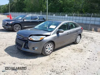 2012 Ford Focus SE with VIN 1FAHP3F22CL456552, listed as a IAAI auction lot 42341696 with 129,699 mi miles and . Bid and sale history available at DreamBid. Image 2.